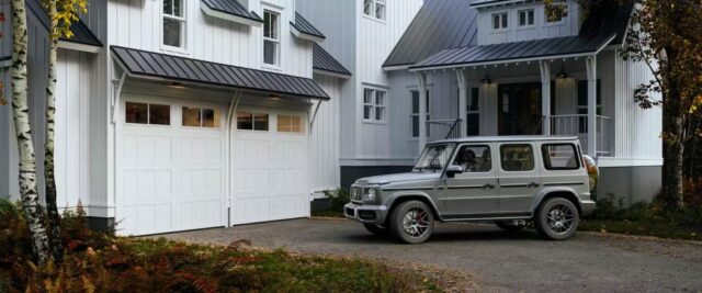 Double Hormann Garage Doors with Upper Windows Featured on a Contemporary Farmhouse in San Jose, CA