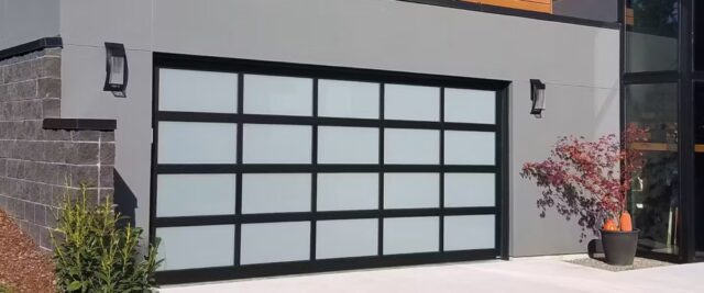 A Contemporary Home Features a Hormann Garage Door with Frosted Glass Window Panels in San Jose, CA