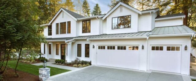 Hormann Garage Doors with Top-Row Windows Installed on a White Residential Property in San Jose, CA