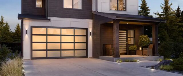 Modern Hormann Glass Garage Door Featuring Frosted Panels and a Contemporary Design in San Jose, CA