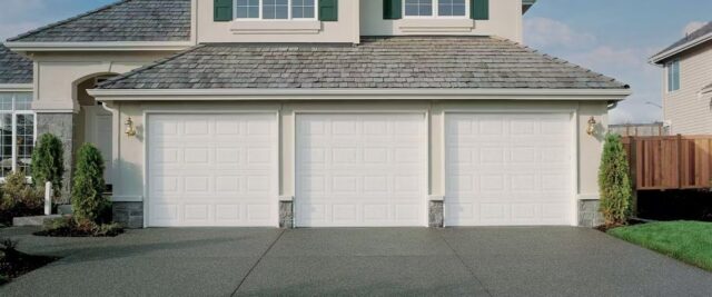 Three Hormann Garage Doors with Raised Panels Featured on an Upscale Residence in San Jose, CA